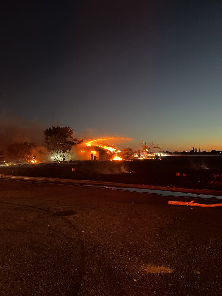 FowlerIncident  near the 1000 block of S.Armstrong is currently 25 acres. Forward spread of the fire has been stopped. Firefighters continue to work on containment of the two structures involved