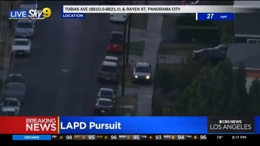 Police are in pursuit of a driver in a silver SUV in the area of Panorama City, who is suspected of a home invasion. Sky9 is over the scene.