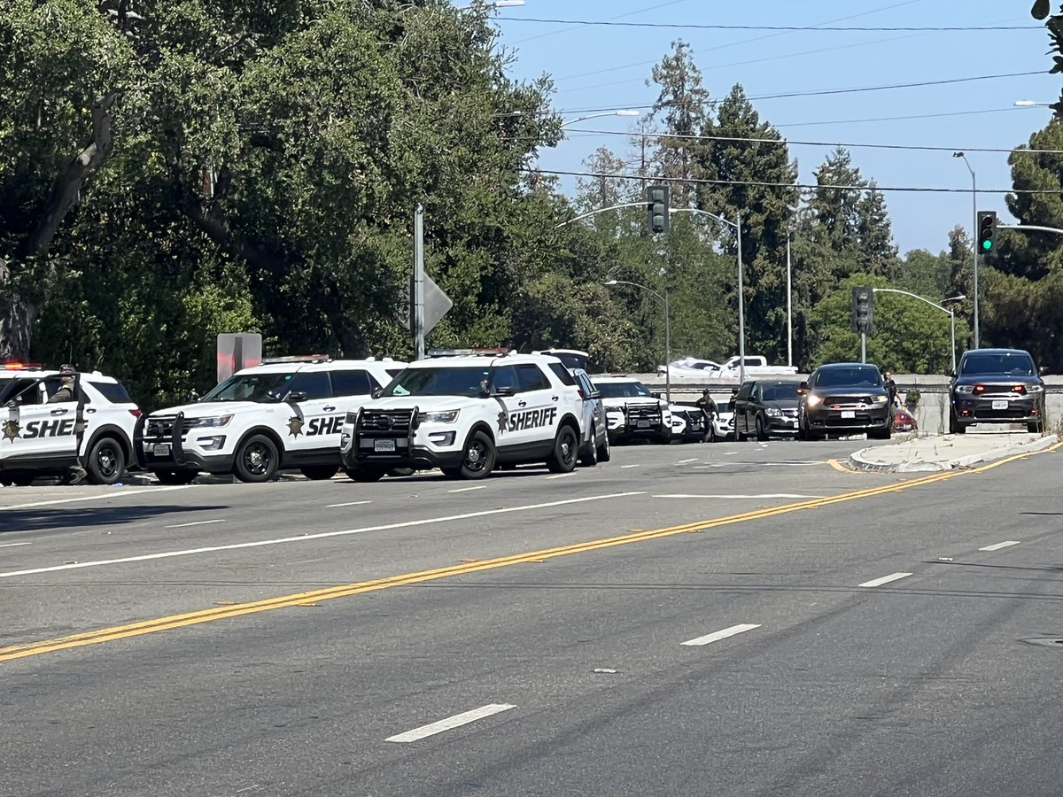 Heavy @SCCoSheriff presence in 2000 block of Bascom Ave in sanjose Deputies arrested woman who fired a shot. Possibly involving vehicle accident. She is under arrest & being transported by ambulance to area hospital for evaluation