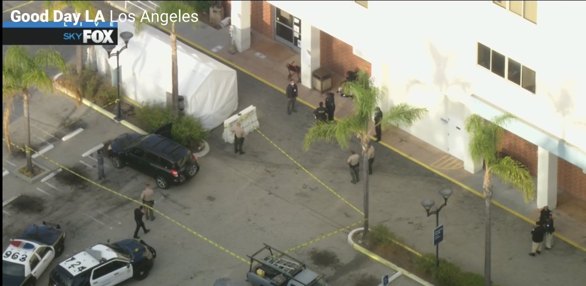 Body of person apparently shot to death found inside car with bullet holes parked in front of hospital ER.  Earlier police responded to a shooting call at 14th and Pacific but found no victim.  Investigation underway