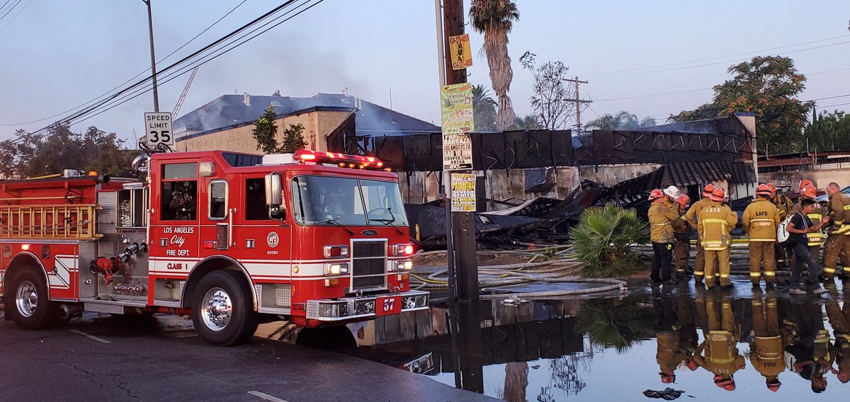 Figueroa south of Manchester is closed do to a commercial fire. Arson investigators have just