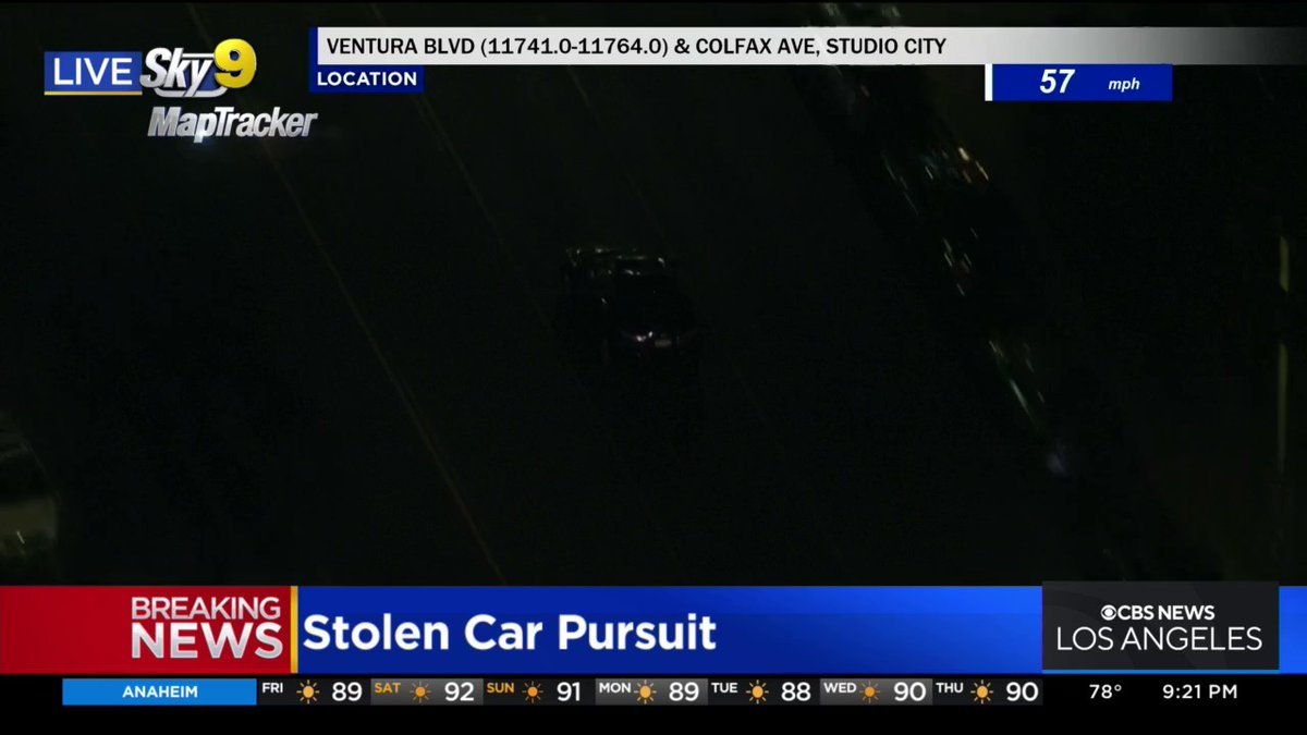 Pursuit: The suspect wanted for a stolen vehicle came dangerously close to hitting pedestrians crossing the street on Laurel Canyon Boulevard in Studio City