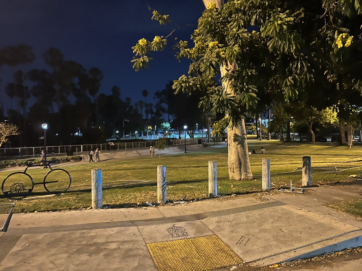 A bunch of the fencing around Echo Park Lake has been taken down. A sign was put up saying Community De-fence