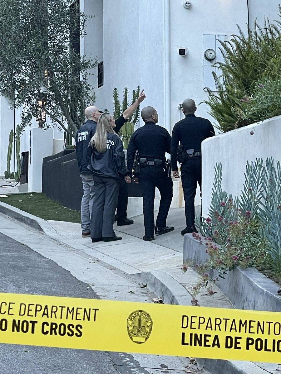 Detectives say the resident was not injured in the Hollywood Hills home invasion that ended in gunfire off Laurel Canyon. Suspects fled in a white vehicle after being shot at by resident