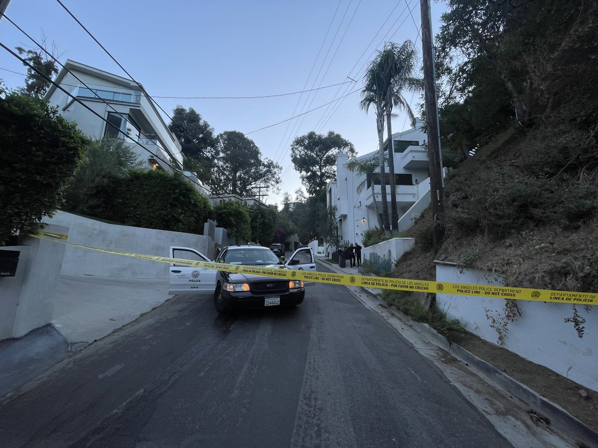 Detectives say the resident was not injured in the Hollywood Hills home invasion that ended in gunfire off Laurel Canyon. Suspects fled in a white vehicle after being shot at by resident