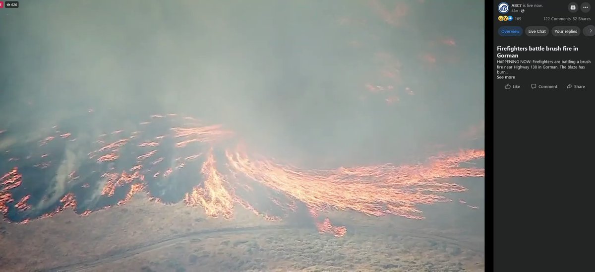 Short video of water, smoke, and flames on the SamFire in Gorman:  Flames move in a circular motion with a smoke plume and water on the Sam Fire