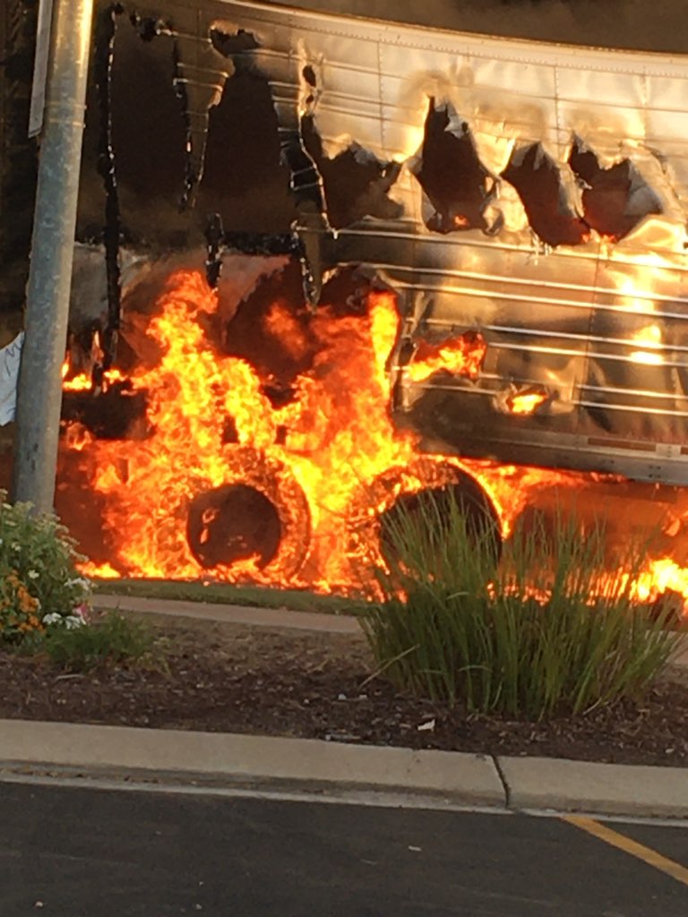 A semi-truck driver is dead after crashing into an ongoing train in Kingsburg, then goes up in flames with several explosions.  