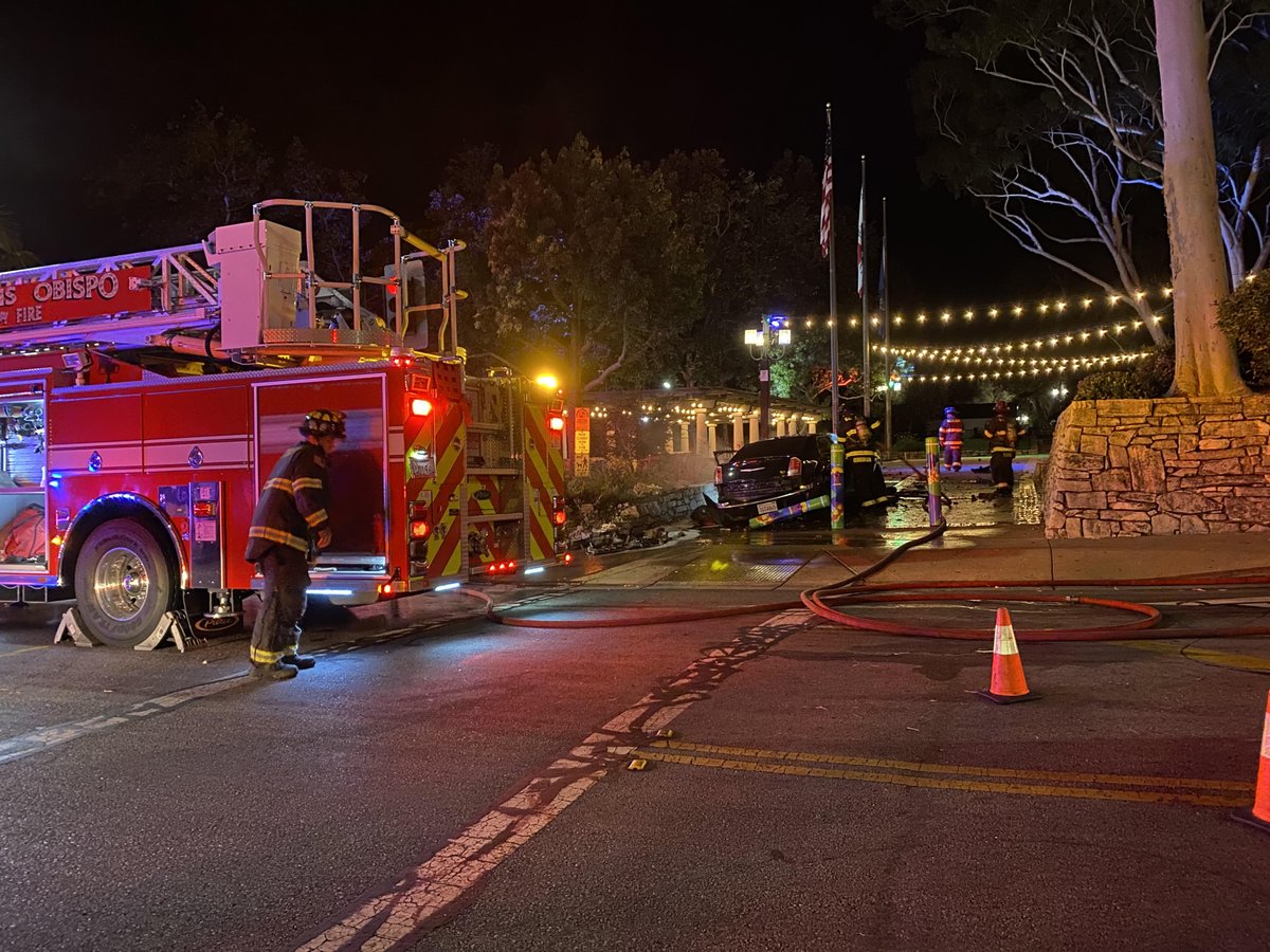 A black sedan ran over a roadblock pillar in front of the Chorro and Monterey street intersection early Tuesday morning