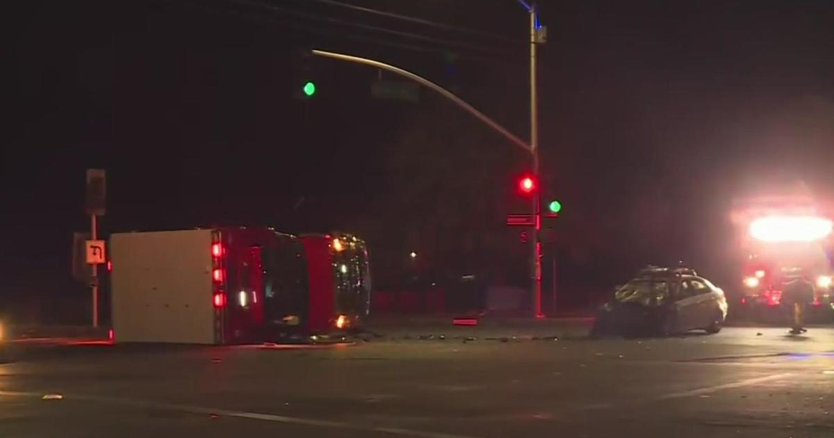 Man hospitalized after crashing into ambulance in Sacramento