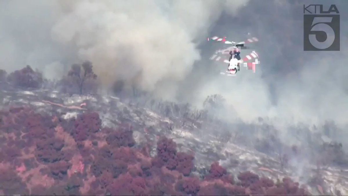 Sky5 was overhead when a helicopter made a water drop on the GulchFire.