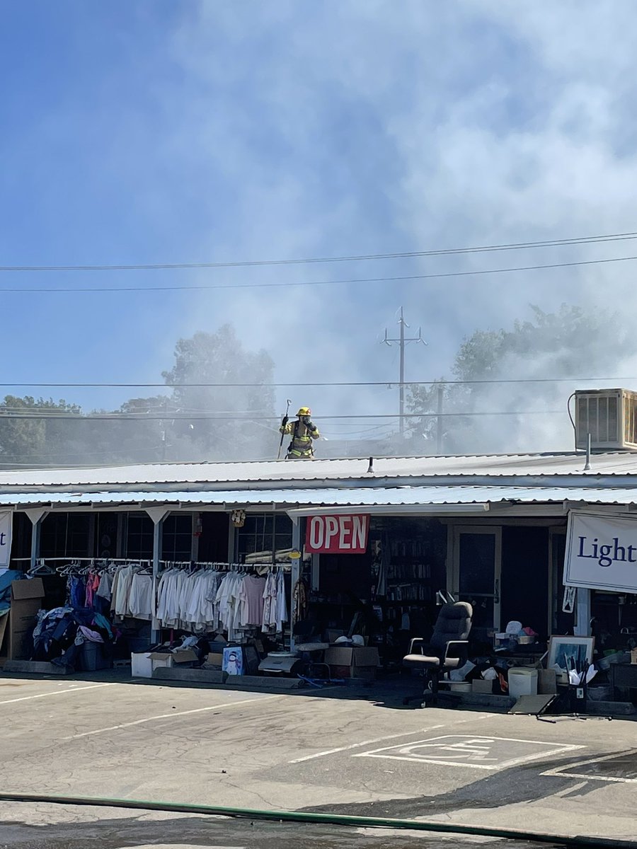 Olivefire Firefighters are making good progress, the building is partially involved with the majority of the fire coming from contents on the outside of it. Olive highway is closed in the area of the fire