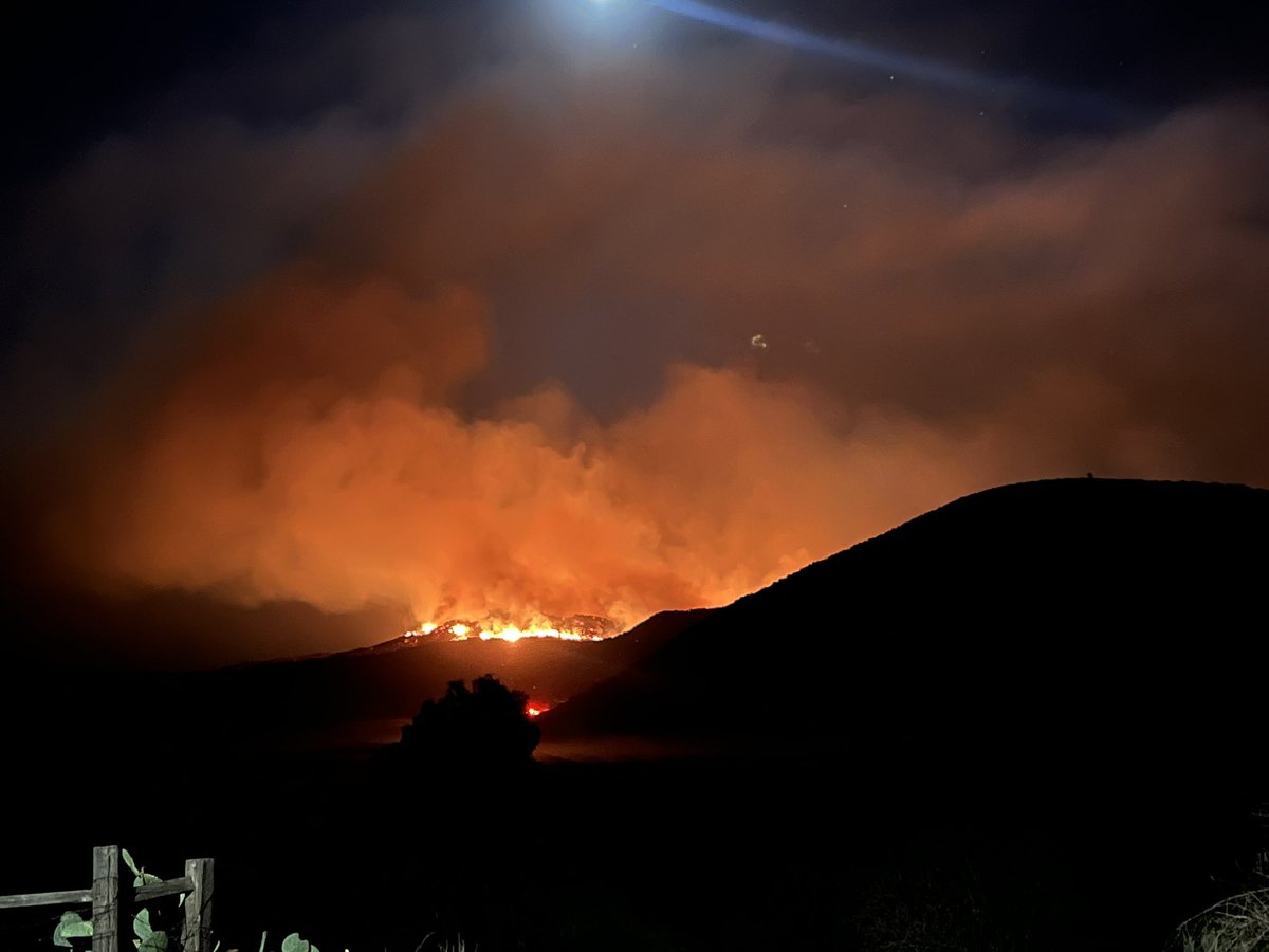 Fairviewfire night water dropping helicopters are in route to the fire. Operations is stating the fire is starting to lay down and activity has slowed