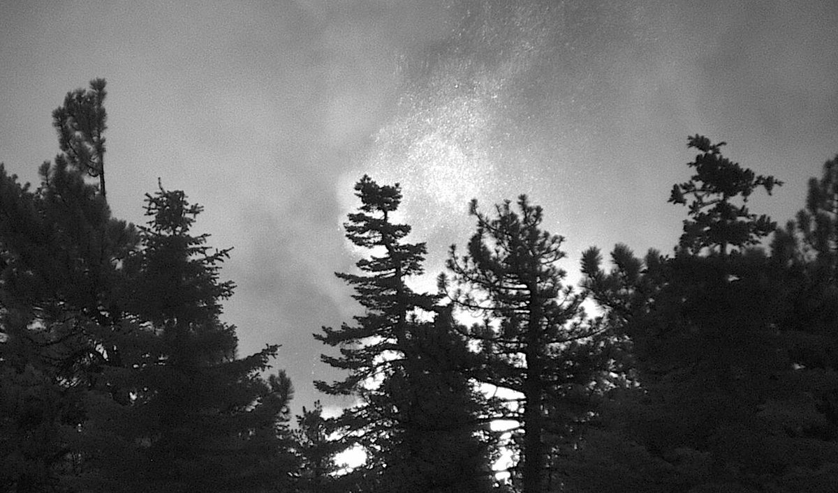 RadfordFire is still burning towards the north & west approx a mile south of Snow Summit. Lots of embers getting kicked up towards the ridgeline. The fire has not crossed 2N10 at this time. Photo from Hwy 38 looking north, Baldwin Lake to the SW and Snow Summit looking south