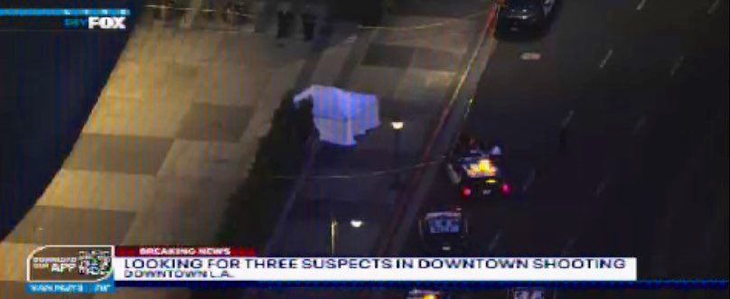 Man found shot to death on sidewalk in Downtown LA near Ritz and Marriott hotels.  Suspects may have been in a Rolls Royce.  Or possibly someone who was with victim took off in the Rolls.  LAPD Central Homicide detectives on scene