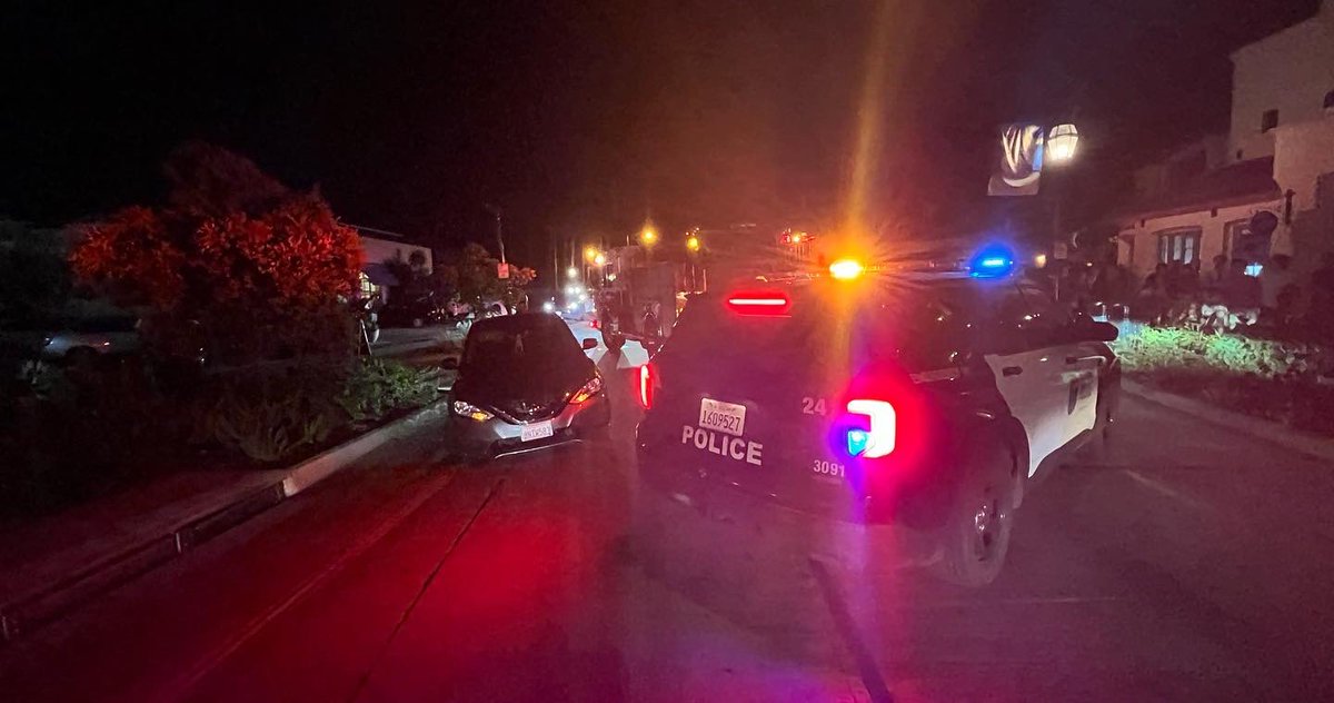 Vehicle crash blocks lower State Street in Santa Barbara. Light pole rammed. Vintage – style  light comes off. Driver going through DUI check by Santa Barbara Police