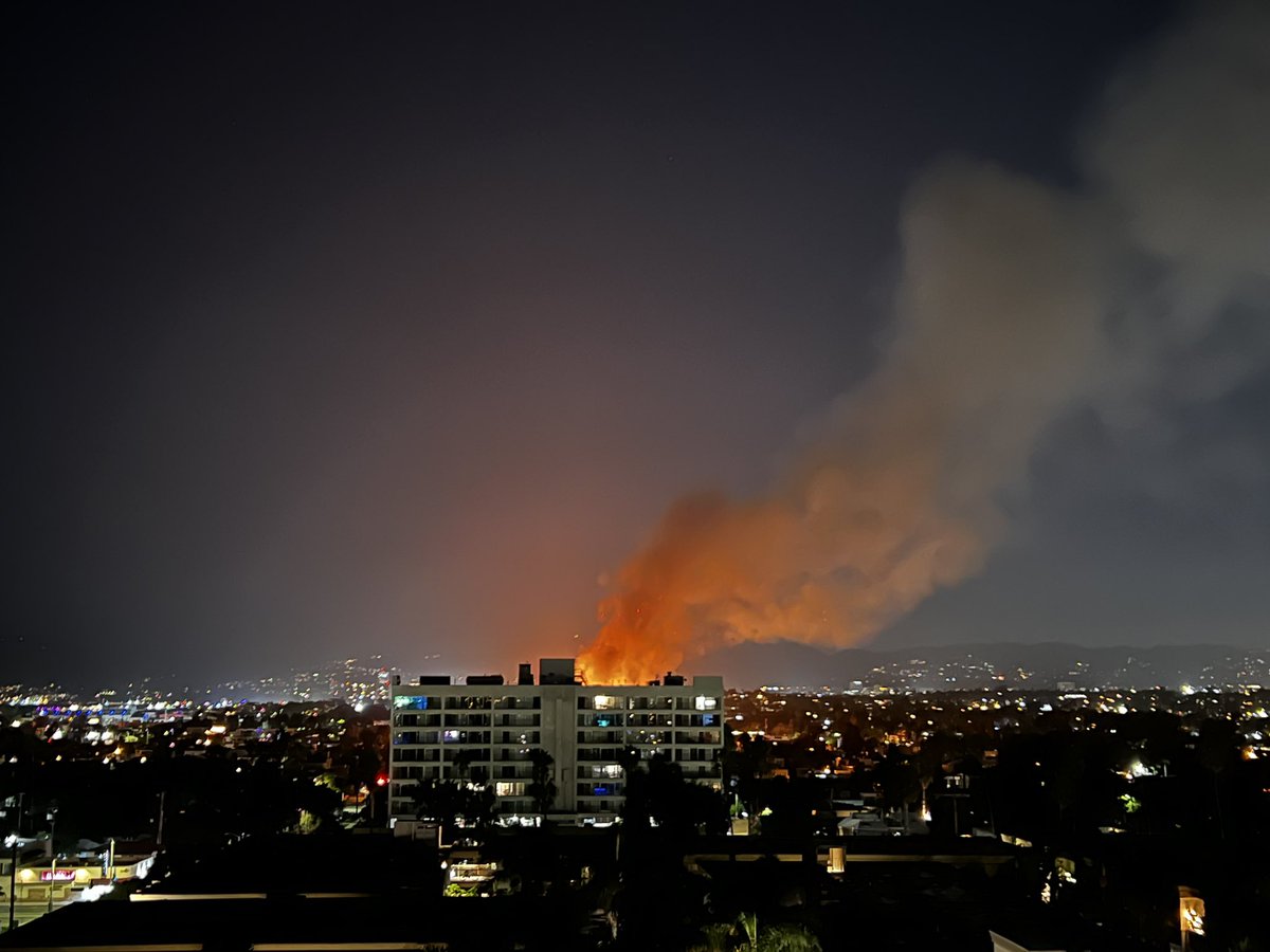 There's a building on fire on Venice Blvd about. smell the smoke.