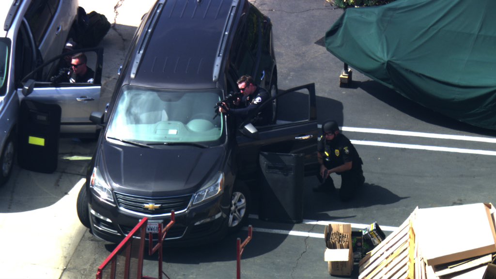 Barricade Costa Mesa DOJ serving a search warrant during entry one shot was fired from inside the building no officers hit now a standoff. Sunset Dr & Monrovia Ave