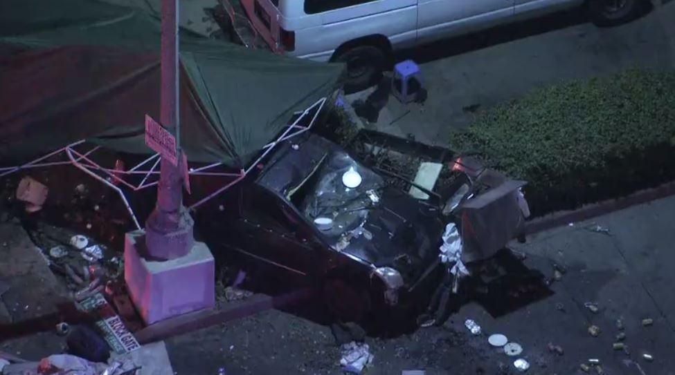 One person was killed and eight others were injured after a car plowed through a taco stand near Holt Ave. and Dudley St. in Pomona tonight. Police are urging the public to avoid the area as they conduct their investigation. 