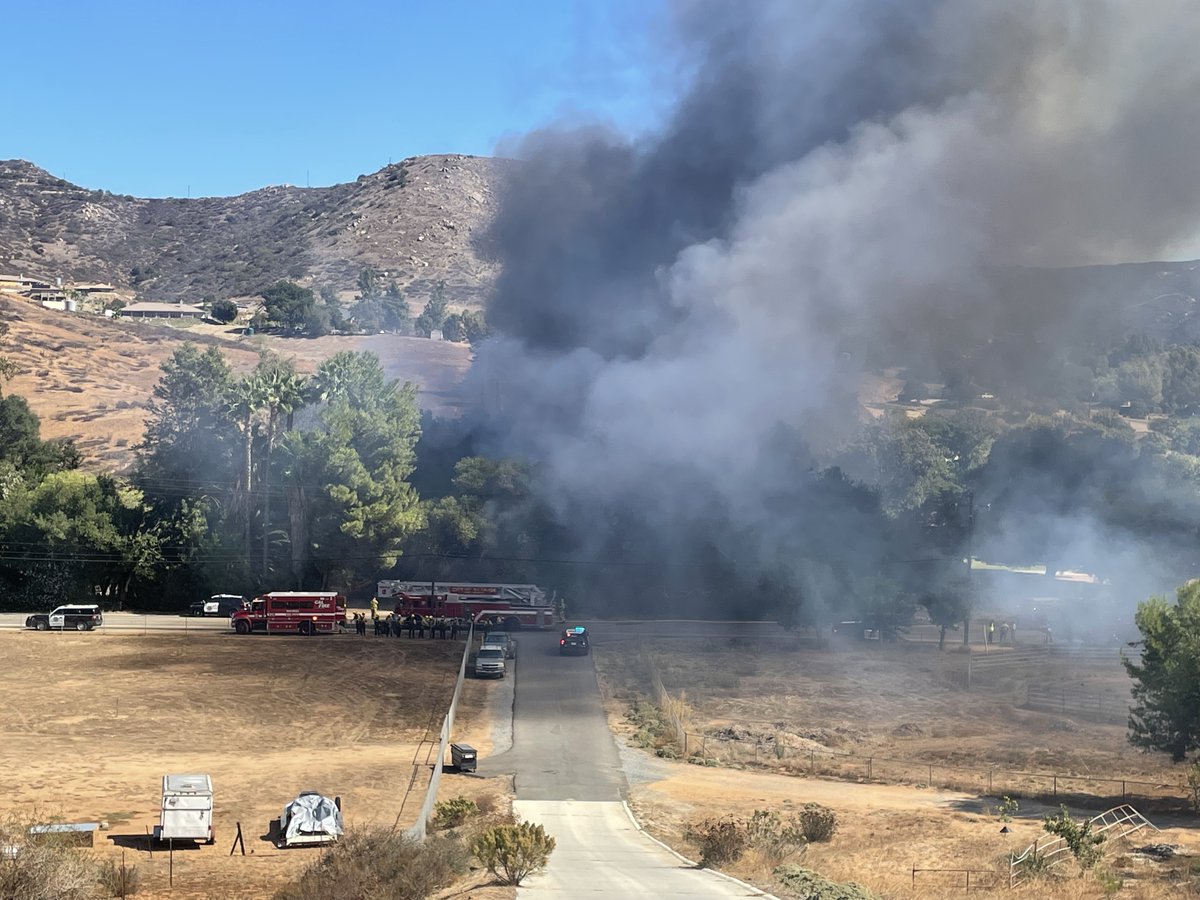 HarbisonFire [update] Fire has destroyed one outbuilding and several cars. The fire initially spread into the vegetation, but is holding at less than 1/2 acre with no active spread. Multiple agencies are assisting on this incident, which will require extensive mop-up