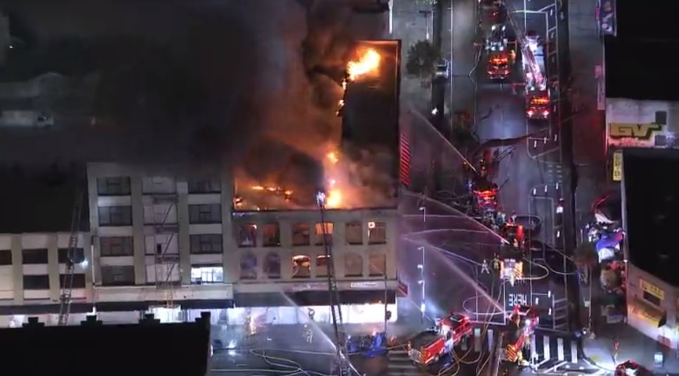 Firefighters are battling a fire at a commercial building in the DowntownLA area. LAFD says they are in the defensive mode.