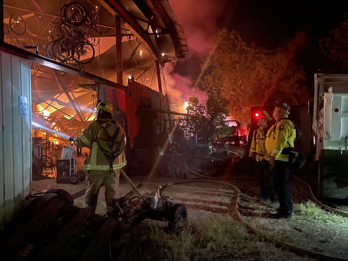 CAL FIRE Firefighters responding to a fully involved structure fire with extension into the vegetation Nishiam Gulch Rd.  in the Penn Valley area of Nevada County. Assisted by Nevada County Consolidated Fire District, Nevada City FD, Penn Valley FD