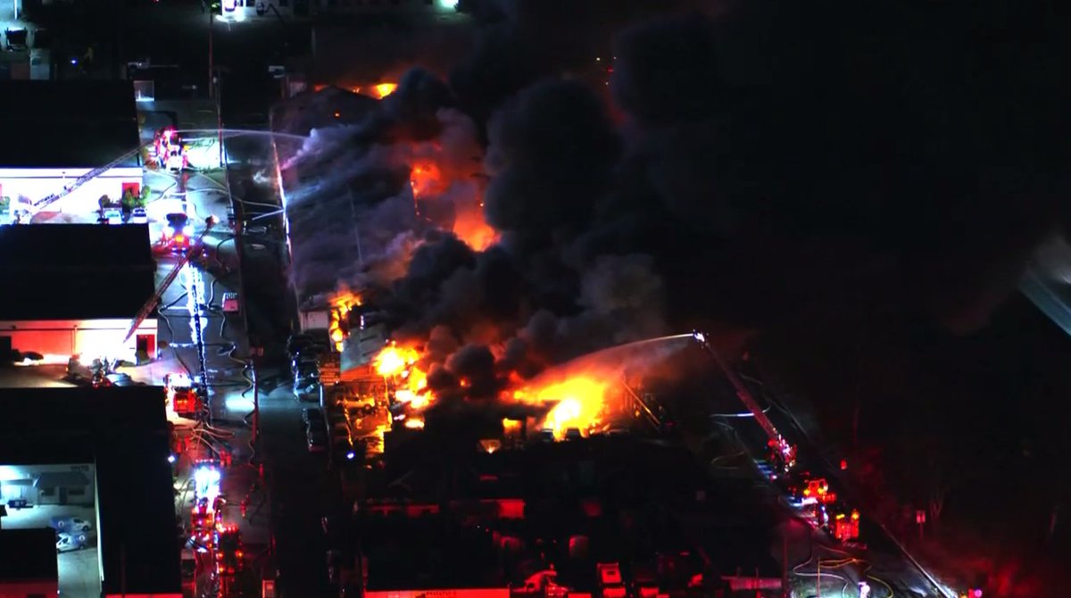 What began as a vegetation fire quickly spread to what is believed to be an auto mechanic shop. LAFD still battling the fire from the ground and air. So far no injuries