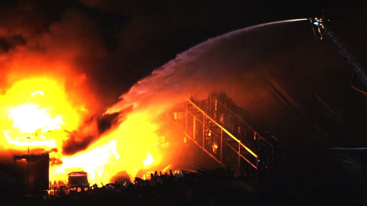 What began as a vegetation fire quickly spread to what is believed to be an auto mechanic shop. LAFD still battling the fire from the ground and air. So far no injuries