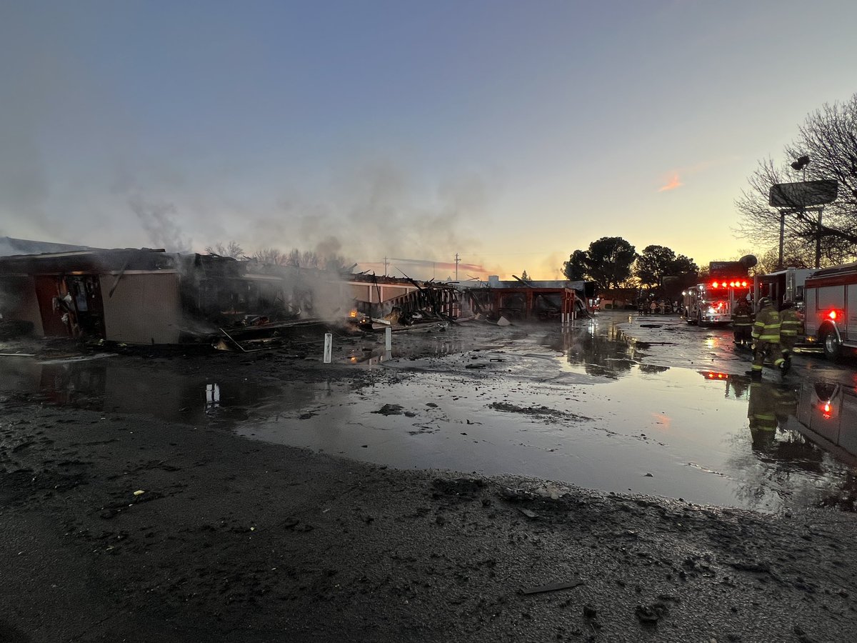Now that the sun is coming up, you can see the damage caused by the early-morning fire at the strip mall. Sunnyside Deli was saved. The owner says there was a dance studio, hair salon, barber shop, pharmacy and Sullivan's to the west of the deli. Those are a total loss