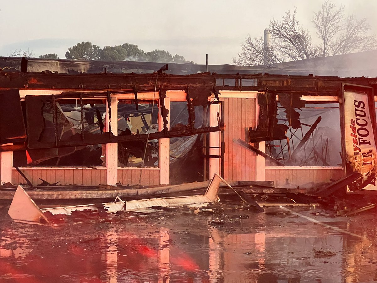 Now that the sun is coming up, you can see the damage caused by the early-morning fire at the strip mall. Sunnyside Deli was saved. The owner says there was a dance studio, hair salon, barber shop, pharmacy and Sullivan's to the west of the deli. Those are a total loss