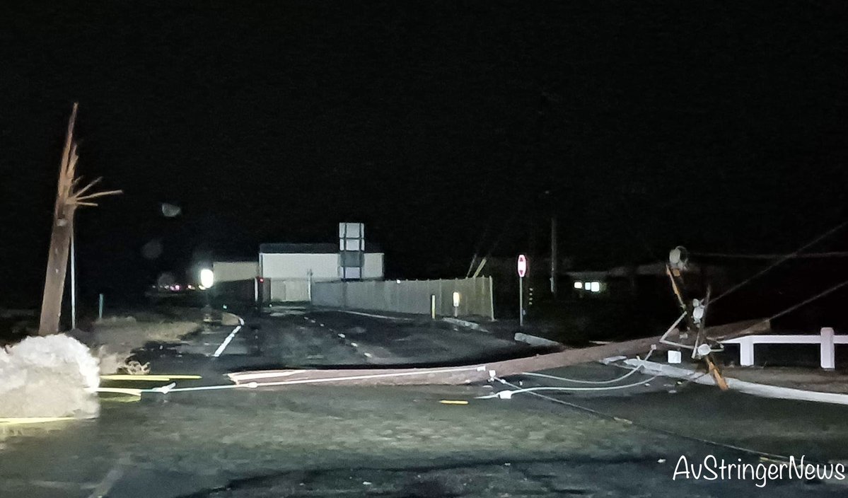 Lancaster,ca; William Barnes Avenue and 50th Street West blocking access to General William J. Fox Airfield. Three power poles completely blown over and snapped top of another pole completely snapped off and just hanging there.