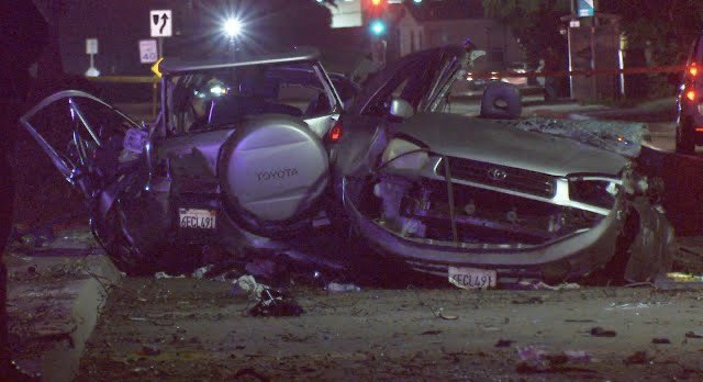 Two people are dead and another four are injured after a crash in Oceanside nearly split an SUV in half tonight