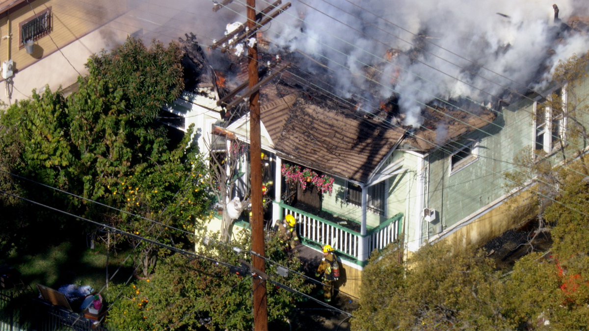 Los Angeles 29th & Maple single family home built in 1910 with fire in the attic. @LAFD on scene no injuries fire fighters working to save property while extinguishing the fire. No injuries  