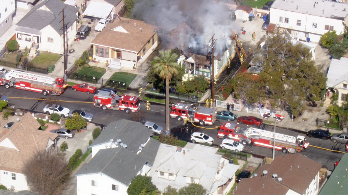 Los Angeles 29th & Maple single family home built in 1910 with fire in the attic. @LAFD on scene no injuries fire fighters working to save property while extinguishing the fire. No injuries  