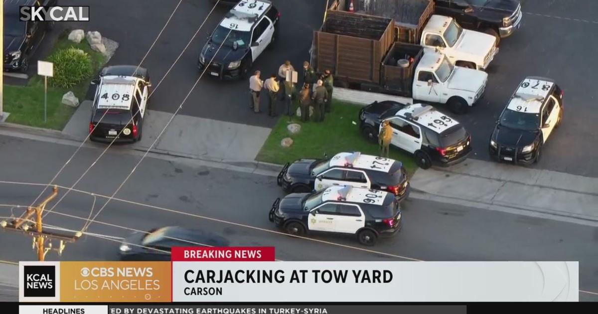 Los Angeles deputies are investigating a shooting at the scene of a tow-yard carjacking. A white Mustang was stolen at the scene. Officials said gunfire was exchanged during the incident