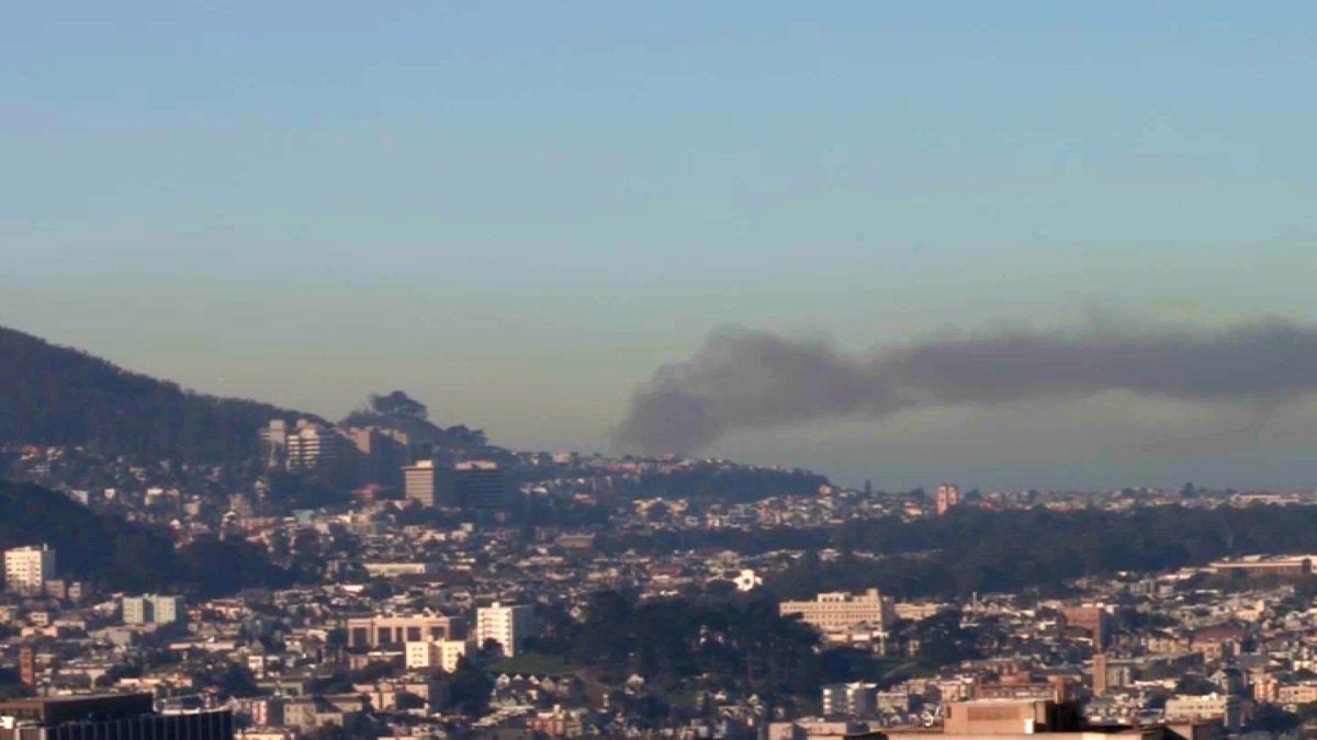 Firefighters are battling a two-alarm fire in San Francisco's Sunset District, according to the fire department