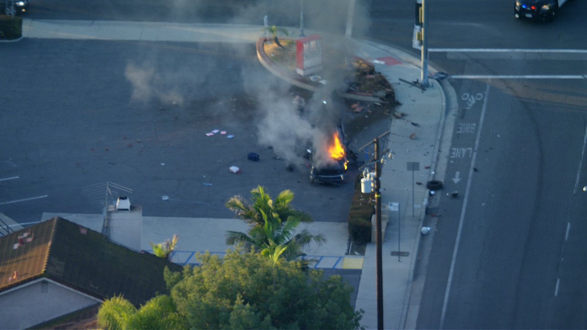 Fire deputies from Lakewood Sheriff Station brave the flames checking for victims. The 2 occupants got out and ran. But caught near by. This all happening in Cerritos at 195th & Pioneer 