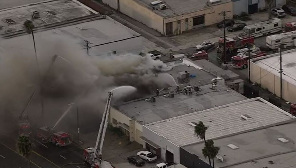 Firefighters battle flames at a commercial building in Compton area