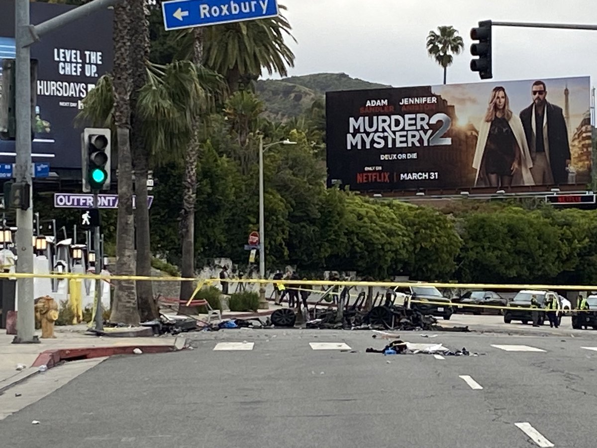 Fiery crash on Sunset Boulevard leaves one person dead and 2 others injured.  The driver of the Tesla reportedly ran off after the crash