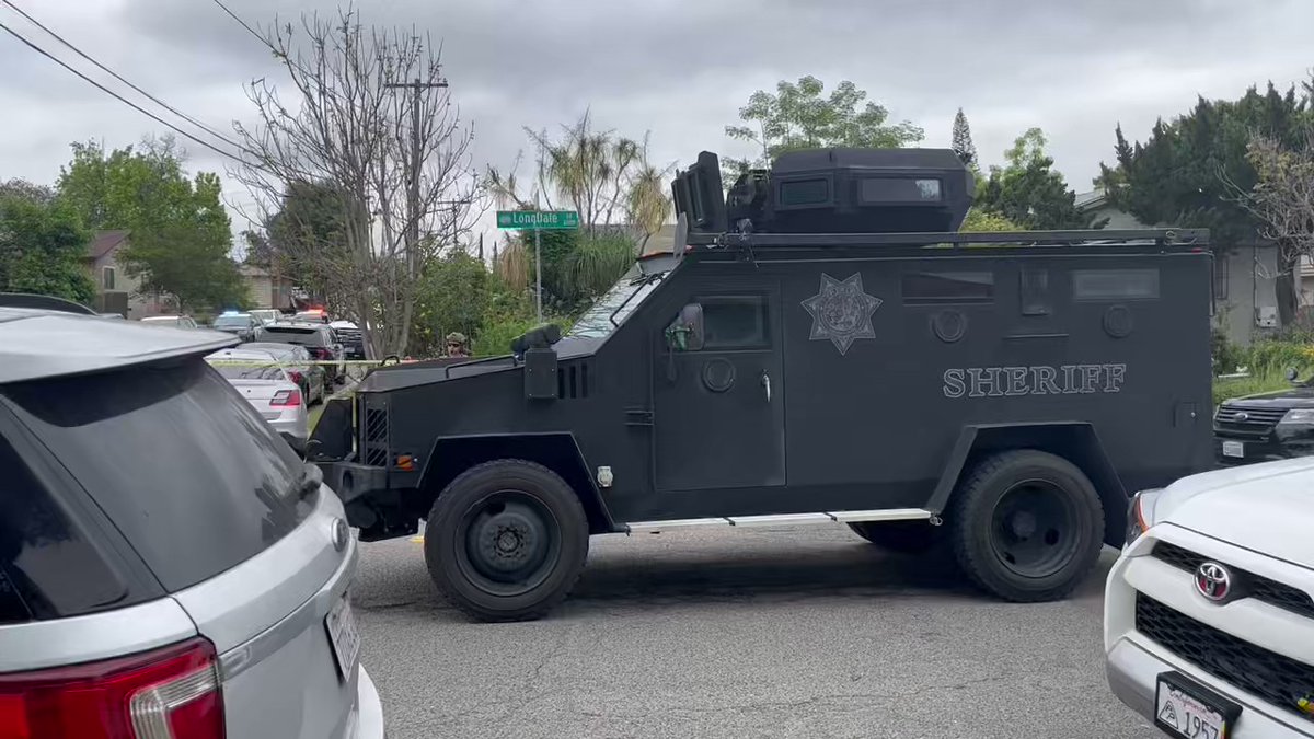 The Sheriff's SWAT unit arriving at scene of shooting in Lemon Grove. Officials have confirmed one person has been shot. There are reports the shooter may still be inside of a home on Longdale Drive