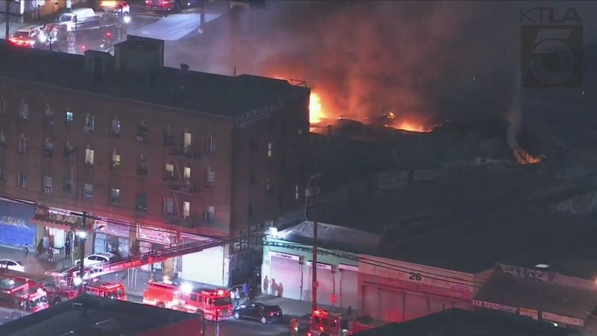 Firefighters battling large structure fire in downtown L.A. Sky5 is overhead.