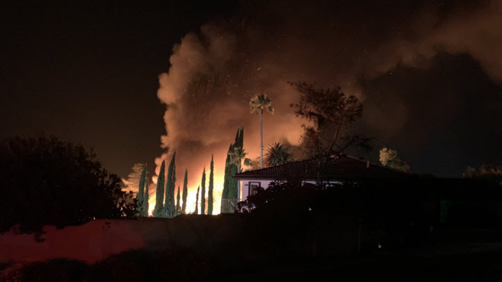 Crews are battling a two-alarm house fire in the Almaden area of South San Jose, according to the fire department.