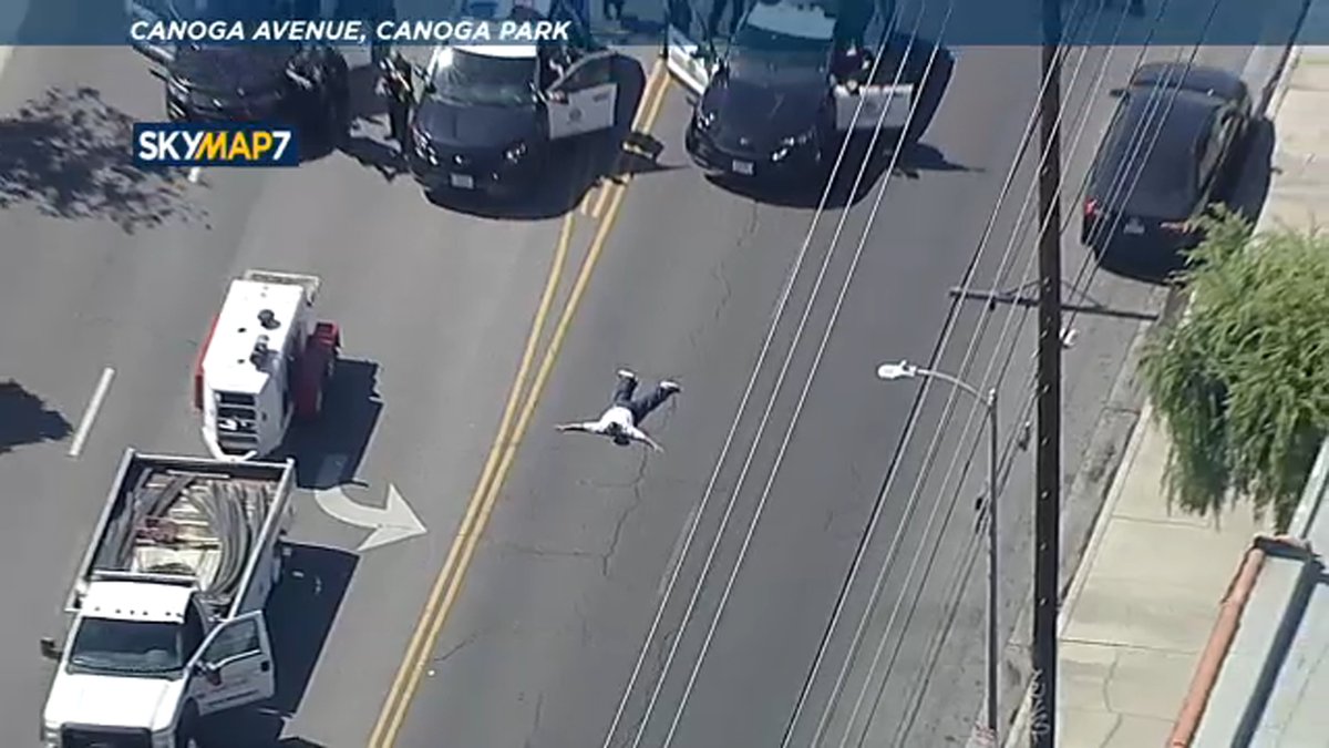Suspect in custody after leading police on prolonged chase - involving many, many spike strips - in San Fernando Valley