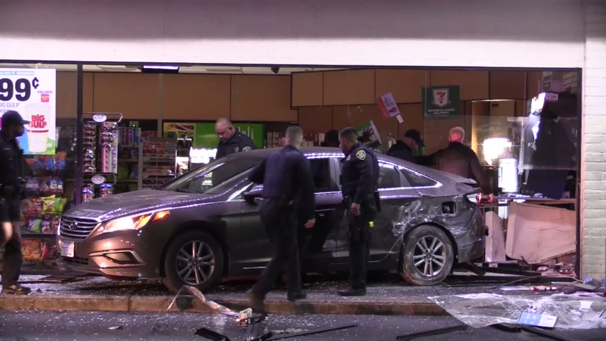 Oakland police responding to a burglary report this morning found a vehicle crashed into a 7-Eleven storefront and merchandise scattered across the parking lot