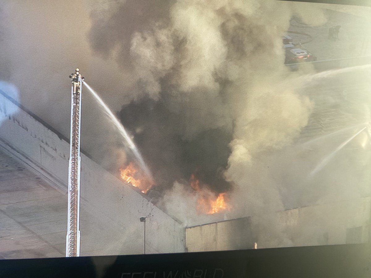 Commercial building fire in DTLA in the GarmentDistrict in a textile store. This is near Los Angeles St.and 11th.