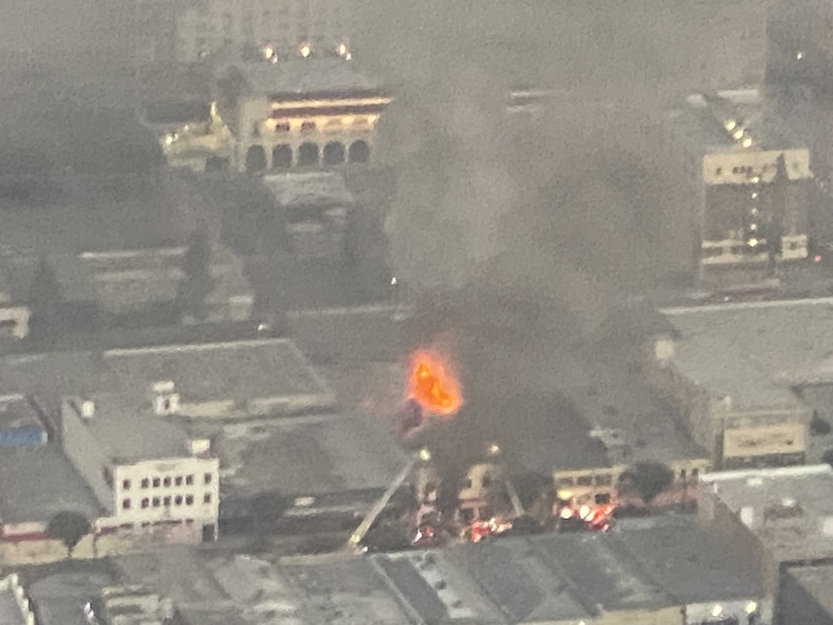 Commercial building fire in DTLA in the GarmentDistrict in a textile store. This is near Los Angeles St.and 11th. 