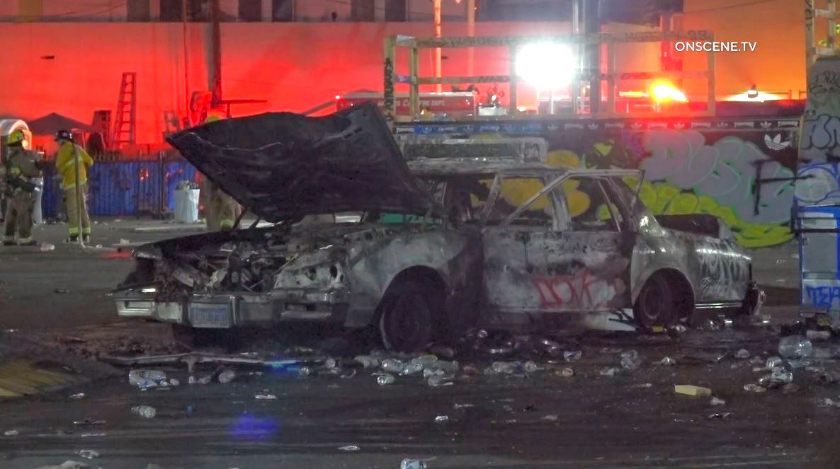 A skateboarding event in Hollywood turned hostile and violent Saturday night when a crowd began setting fire to property and at least one vehicle.