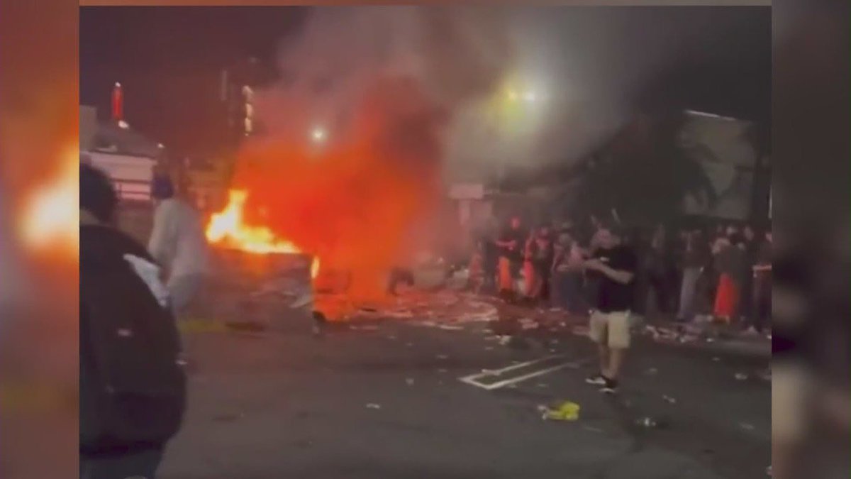 A skateboarding event in Hollywood turned hostile and violent Saturday night when a crowd began setting fire to property and at least one vehicle.