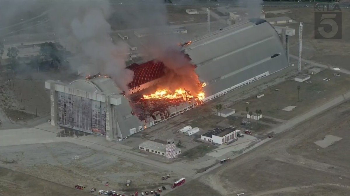 Historic hangar at former air base in Orange County engulfed in flames. 