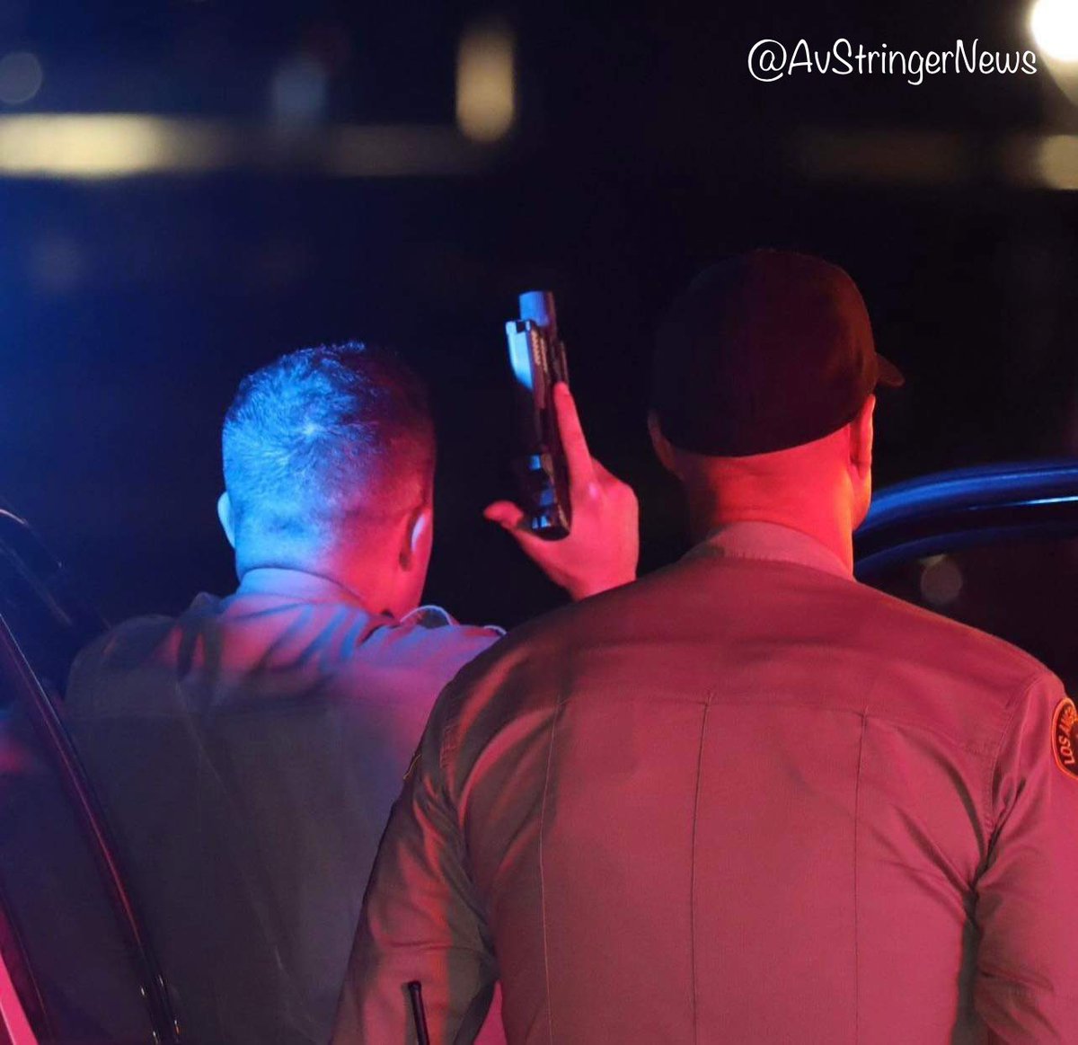 Lancaster,ca: deputies detaining a 1029v(reported stolen vehicle) at gunpoint on Division st and ave J-11, vehicle occupied by 3 people,3 detained. 