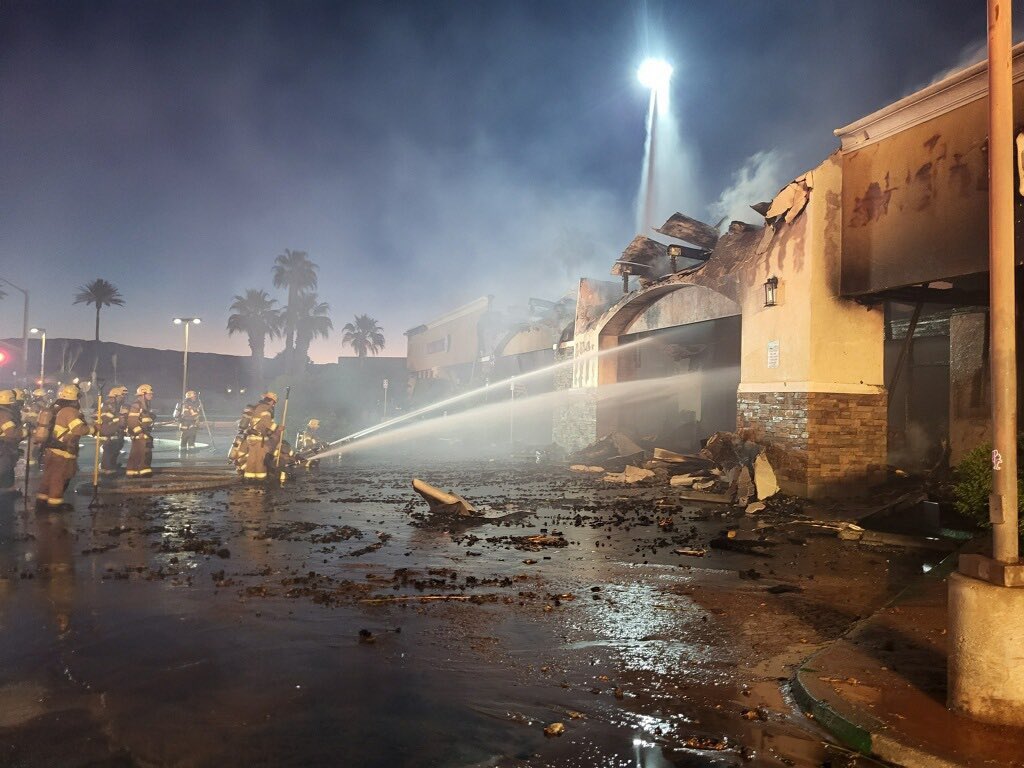 A massive fire gutted some businesses in Palm Desert overnight. No cause revealed yet. D'coffee Bouteaque, Miracle Ear and  Reverse Mortgage Works look to be destroyed. Papa Dan's Pizza damaged